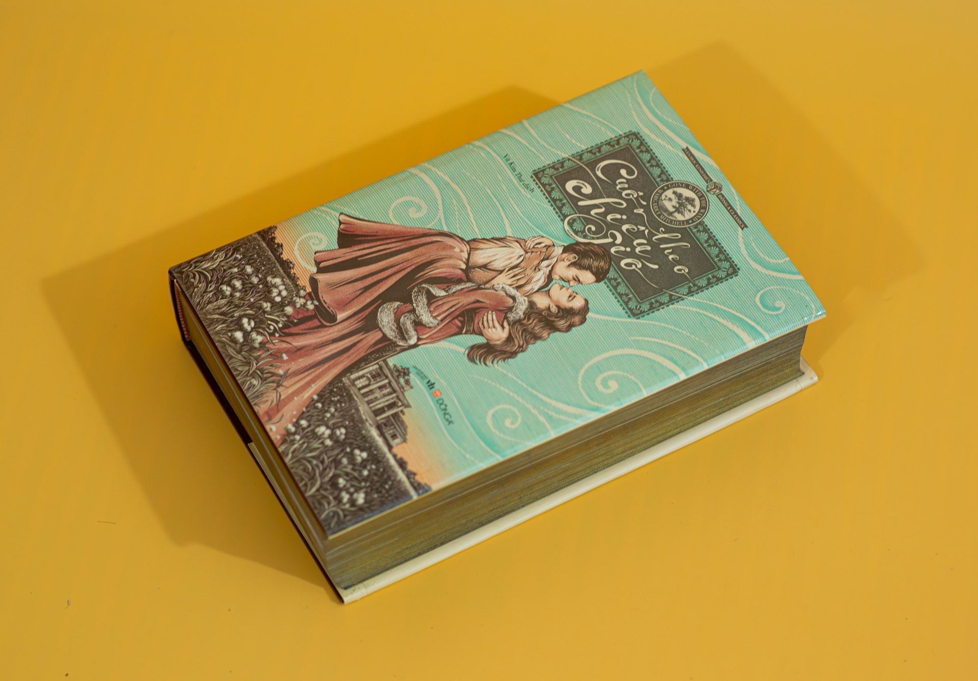 a book sitting on top of a yellow table